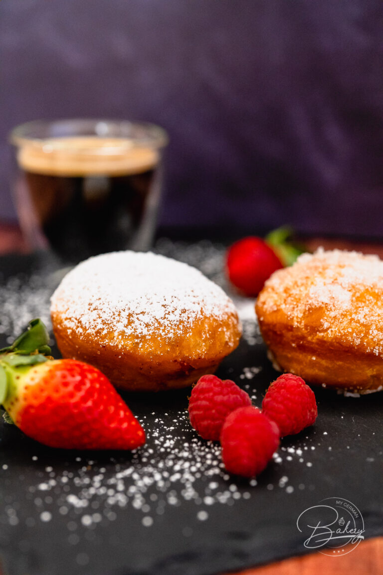 Classic jelly donuts recipe or Bismark Donuts Recipe - Homemade Jelly Doughnuts and Bismark Doughnuts - German Berliner Pfannkuchen recipe to bake in a pan. Jelly donuts with yeast and oil. Filled with jam or custard.