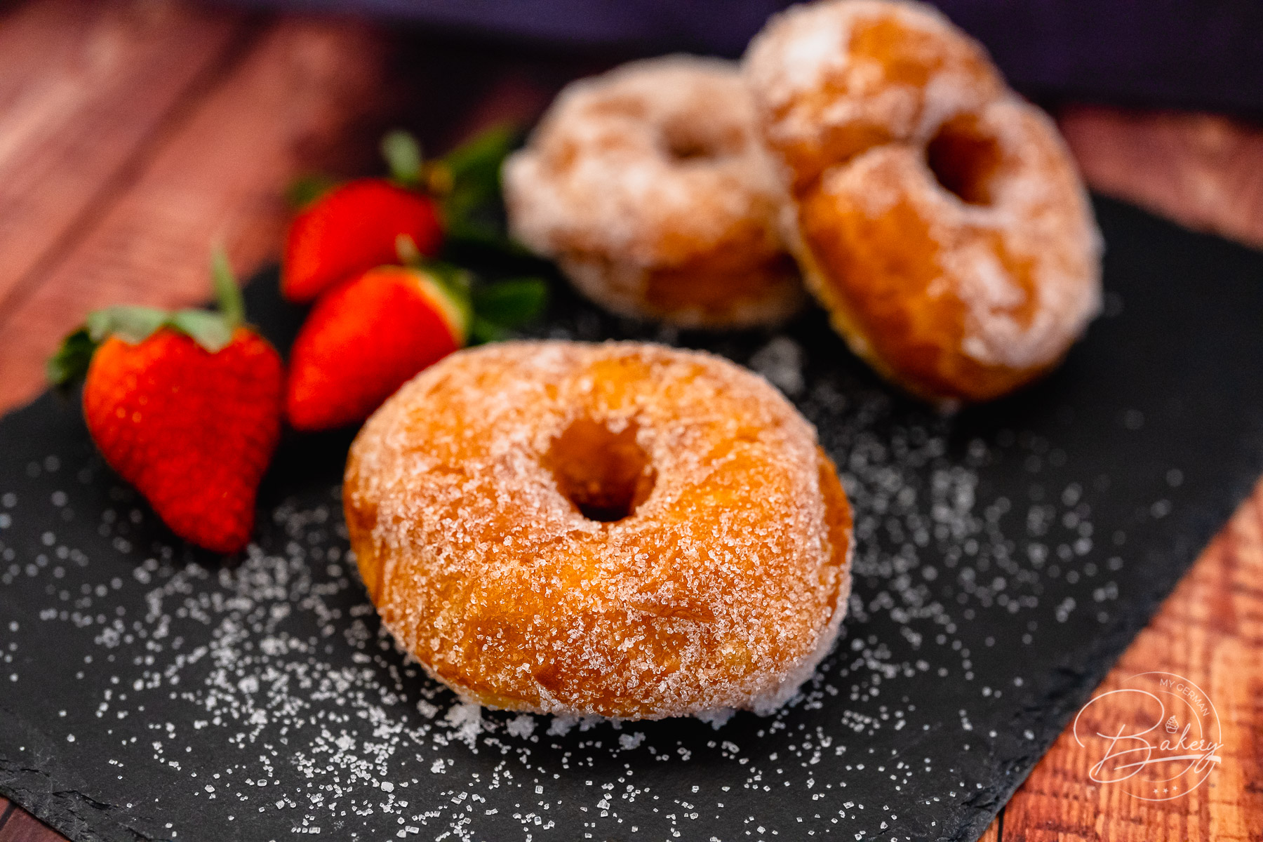 Donuts recipe - delicious, fluffy, easy and quick homemade - Make your own donuts - simple donuts recipe and Berlin variant with yeast dough baked in a pan. Delicious donuts cake rings with sugar, powdered sugar, chocolate.