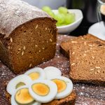 Dark brown bread as a wholemeal bread recipe with rye meal and sugar beet kraut or sugar beet syrup. Dark bread, like pumpernickel bread